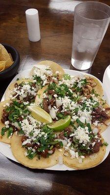 $1 street tacos.  2 beef fajita, 2 chicken fajita, 2 barbacoa,  and 2 el pastor