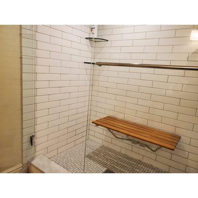 Steam shower with a bench