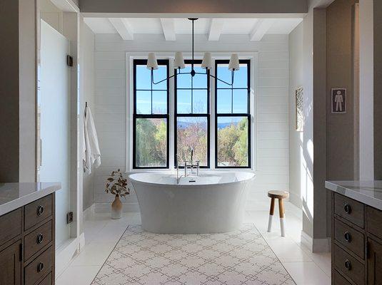 Master bath/ensuite addition takes full advantage of views (and privacy).  Features his/hers water closets (no more waiting for your turn)!