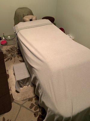 Massage table