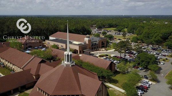 Aerial view of church buildings.