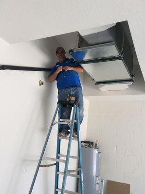 Progressive Air Systems Technician Changing a Filter