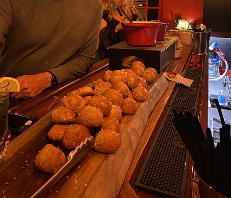 The pretzels are served at the bar with melted cheese.  Yummy.