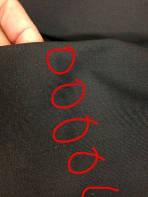 Stitching done through the pants