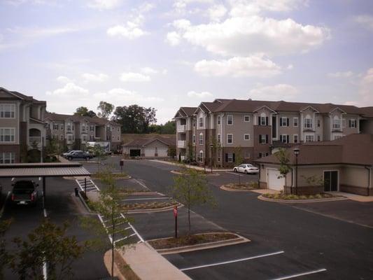 Ariel view of the community with view of the covered parking and garages.