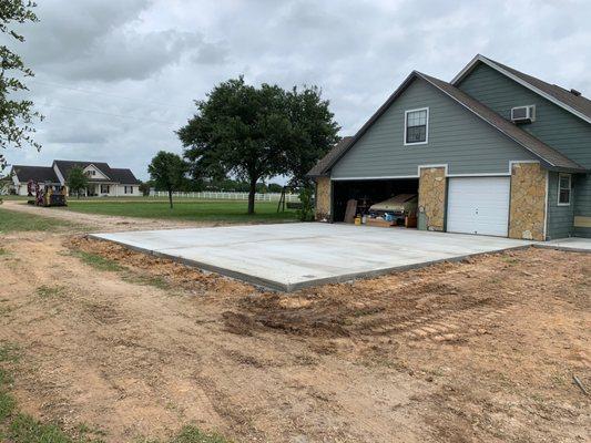 New driveway to accommodate 3 trucks and a new steel porte cochere