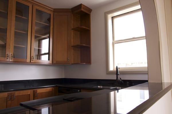 Kitchens at Bently Nob Hill  feature ample natural light and new cabinetry.