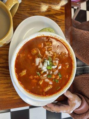 Menudo rojo with home made tortilla  Mom approved .   Lots of meat and   flavors were on point