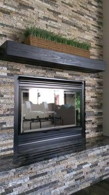 Earth Blend Split Stone Tiles on a fireplace. A beautiful blend that goes with any design style.