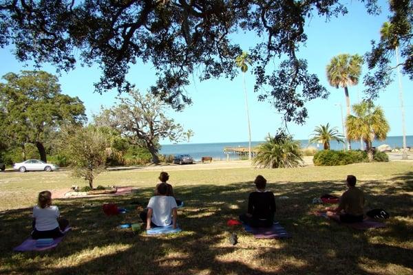 Yoga and Meditation in the park overlooking the serene gulf of mexico.