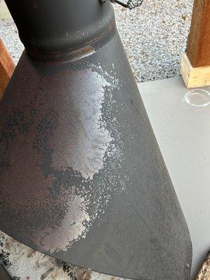 coating bubbled and peeled off after first fire. Unit was purchased NEW for a new construction.