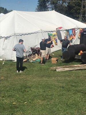 Volunteers out back cooking it up!