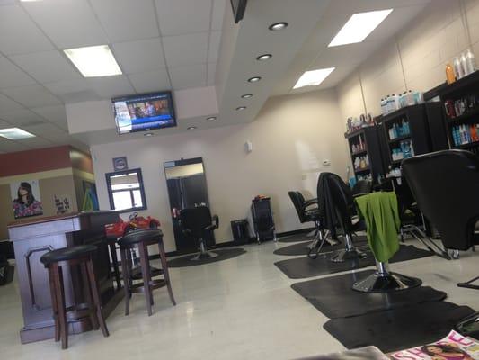 Look at the cute "red car" seat for children to get hair cuts in!