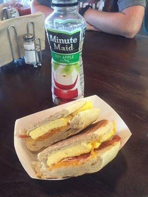 Breakfast panini with Apple juice.