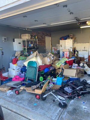 One side of the garage with a lot of stuff I wanted to keep.