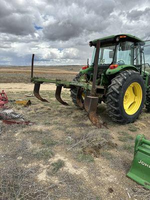 John Deere 6130 w/ ripper subsoiler