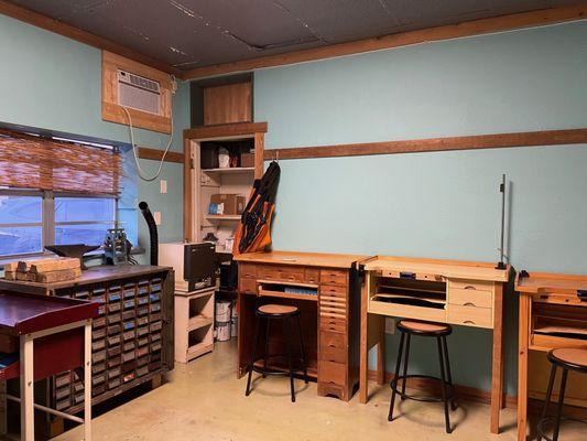 Our soldering/welding station, tool cabinet, mini library, etc.