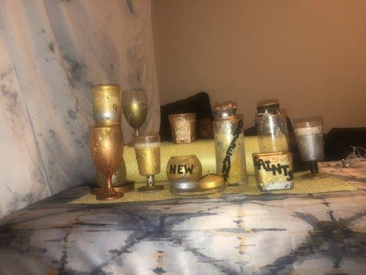 This is a collection of New Orleans saints scented candles , filters, regular glass to use. With yellow hearts an clear stones