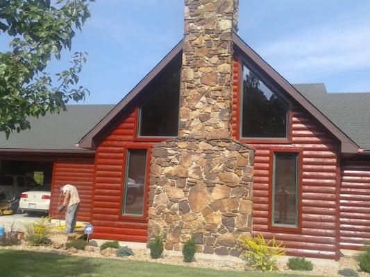 Power-washed & re stained log sided home