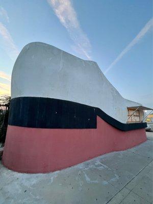 A Shoe Repair shop is inside this Humungous Shoe Shaped Building that's 25 feet tall & 32 foot long@  The Big Shoe Repair in Bakersfield CA.