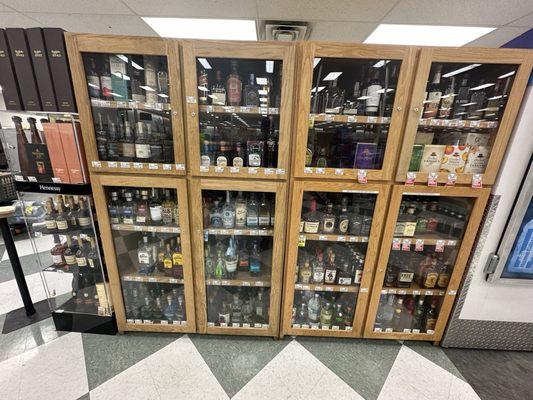 Liquor behind cash registers