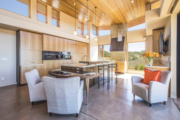 Eucalyptus and walnut kitchen featuring a full Miele package. Located in Carmel-by-the-Sea , CA.