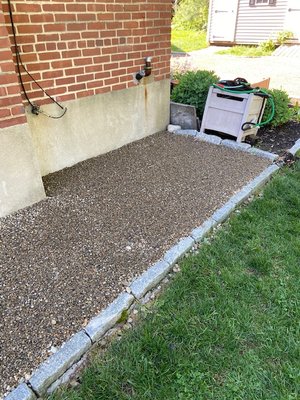 Matched the French drain with the driveway gravel.