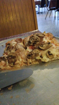 Sicilian style sausage and mushroom pizza