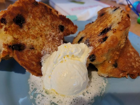 Blueberry muffin on the grill with butter