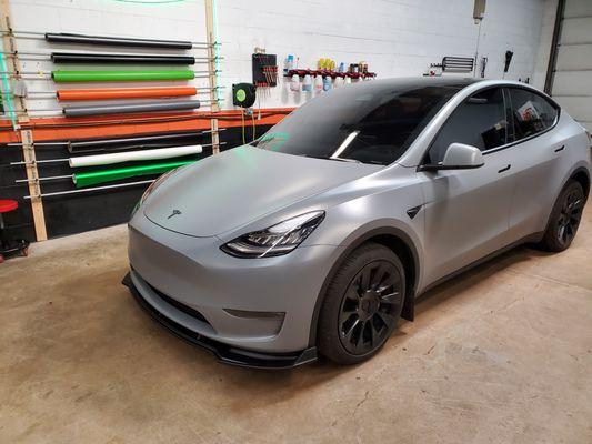 Tesla model Y gets wrapped in Nardo Satin Grey