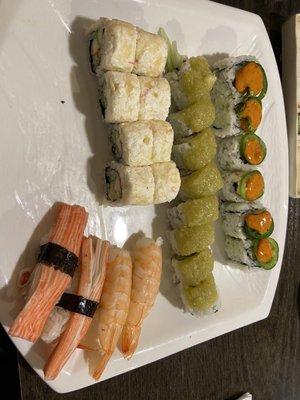 Part of the dinner combo: Snow White, wasabi crunch, and jalapeño rolls. Two pieces of crab sushi and two pieces of shrimp sushi.