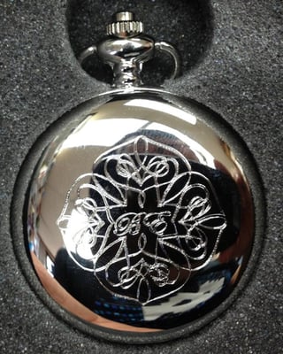 Supplied pocketwatch engraved with the logo from their wedding invite