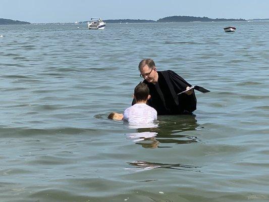 Open ocean baptism with Father Gray