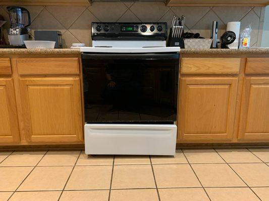 Stove itself, notice crooked shelf