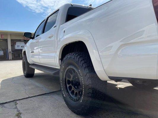 High-lifted truck suspension repair and wheel alignment