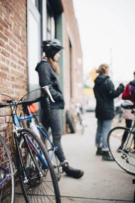 Hanging out outside the shop.