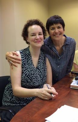 Realtor Linda Burnett(r) with happy client Allison Cooley on closing day.