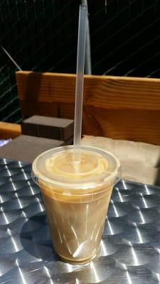 Iced cafecito de olla, so apparently I got a medium, it literally is the size of a kids cup (btw the straw is a regular sized straw)