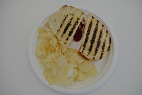 Grilled Vegetable Panini with grilled zucchini, grilled peppers, grilled portabello mushrooms and mozzarella cheese on toasted sourdough