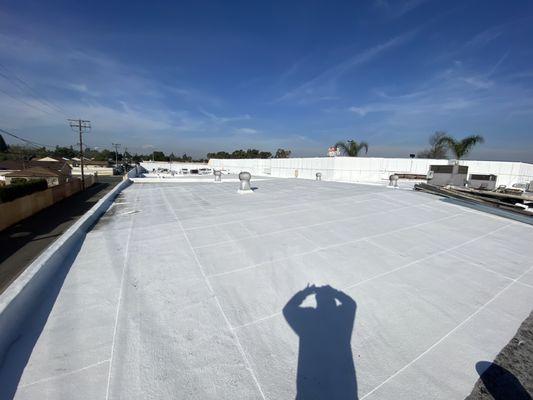 Successful commercial Property Re-roofing and Silicone Coating for Multiple Business plaza.