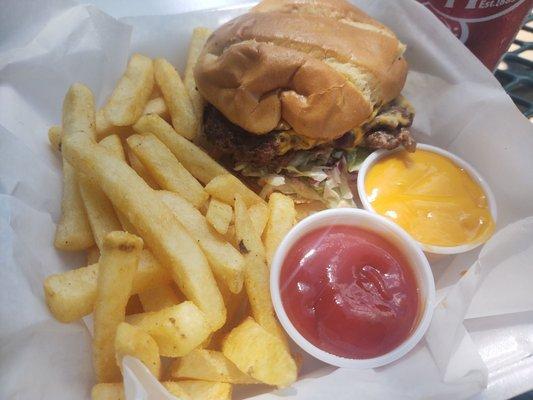 Double cheeseburger old fashioned style. Fries with cheese