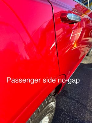 Shows the passenger door and how it should close flush unlike the repaired driver door