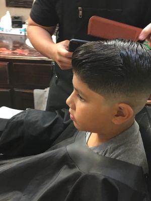 Yuniel is the man, he does the best haircuts in town, and is awesome with kids. Brought my son in for his first barber shop cut.