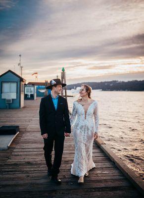 Wedded Couple on Lake Coeur d'Alene boardwalk in ID - Photos by Kendra with Earthbound Photography