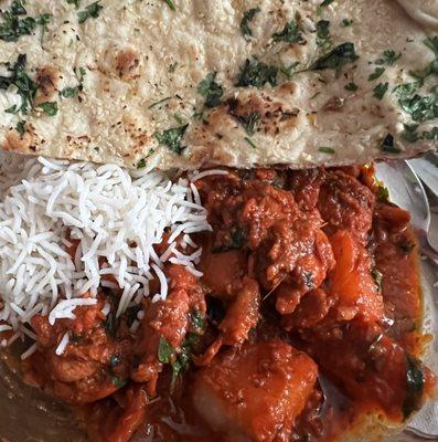 Chicken vindaloo and garlic naan.