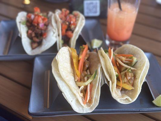 Shrimp tacos and pork belly tacos with a sex in the beach.