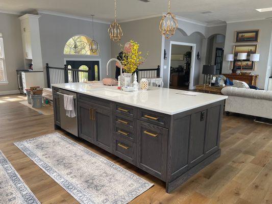 Beautiful large kitchen island by JAS Construction Group