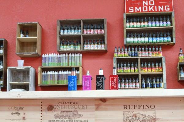 Try our premium super high VG e-juice lines  on our 12 feet custom wooden wine crate tasting bar.