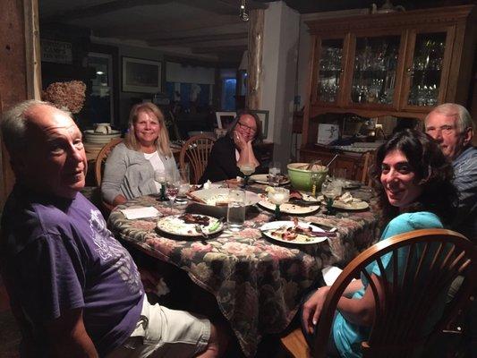 Sharing the meal with guests.