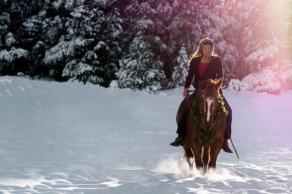 Our Trainer, Brittnee, working with a horse.